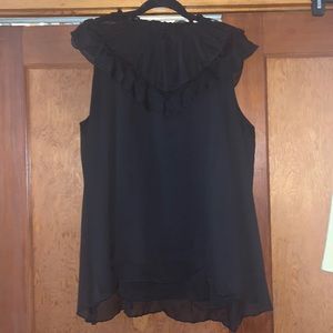 Black top with cap sleeves.